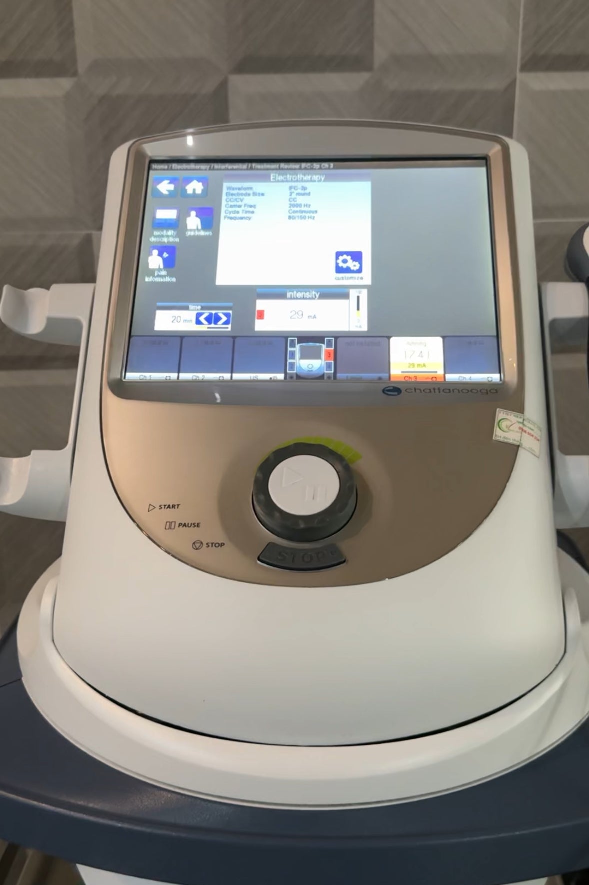 Medical device with a digital display and control panel on a gray background